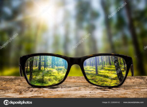 glasses focus background wooden eye vision lens eyeglasses nature reflection look looking through see clear sight concept transparent sunrise prescription sunset vintage sunny sun retro - stock image